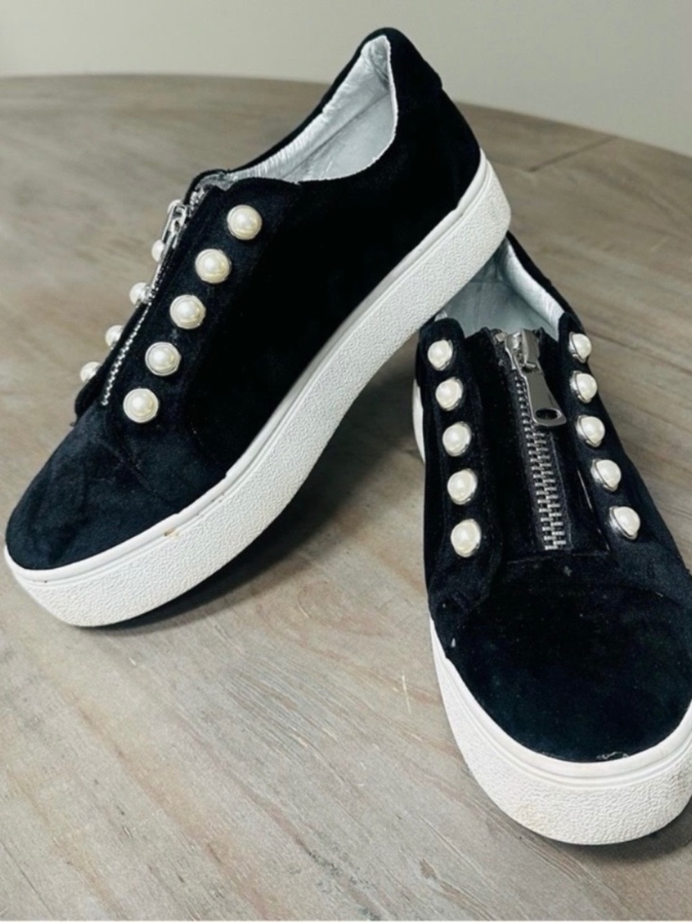 Steve Madden black, velvet sneakers with pearl stud accent.